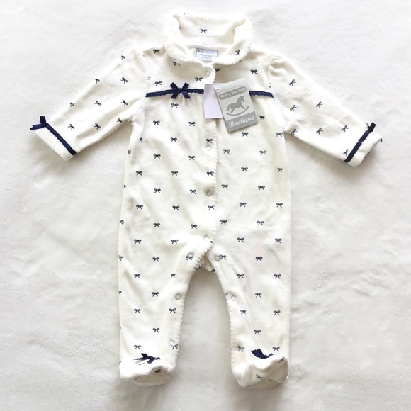 Soft velour footed onesie with bows